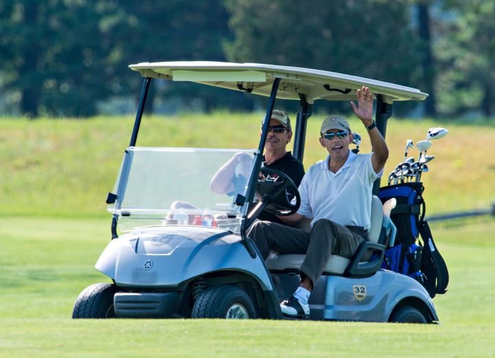 Obama playing golf