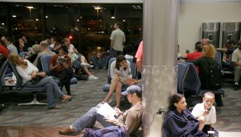 Passengers waiting for a delayed Delta Airlines flight at Hartsfield-Jackson Atlanta International Airport.