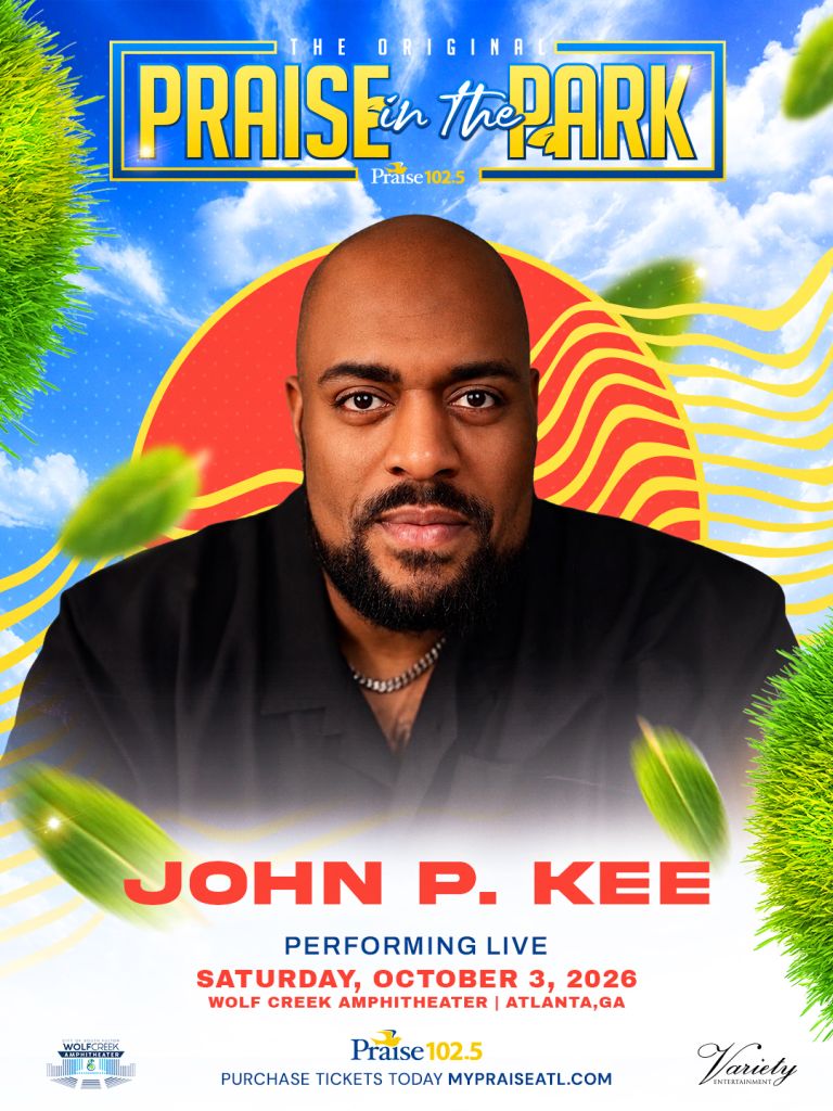 A portrait of a bald, bearded man with a serious expression against a colorful background. The text "THE ORIGINAL PRAISE IN THE PARK" and "JOHN P. KEE PERFORMING LIVE SATURDAY, OCTOBER 3, 2026 WOLF CREEK AMPHITHEATER | ATLANTA,GA" is visible.